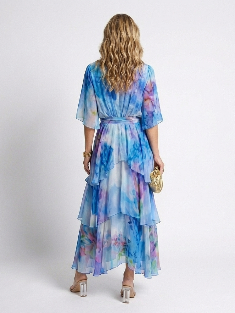 Calista | Maxikleid mit V-Ausschnitt, transparenten Lagen und Taillenband