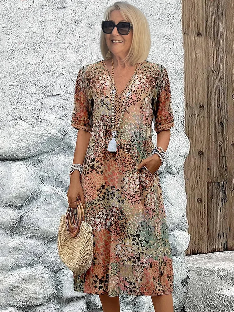 Roxanne | Lebhaftes geblümtes Wickel-Midikleid