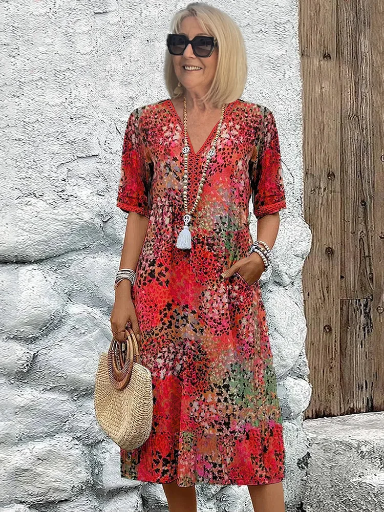 Roxanne | Lebhaftes geblümtes Wickel-Midikleid