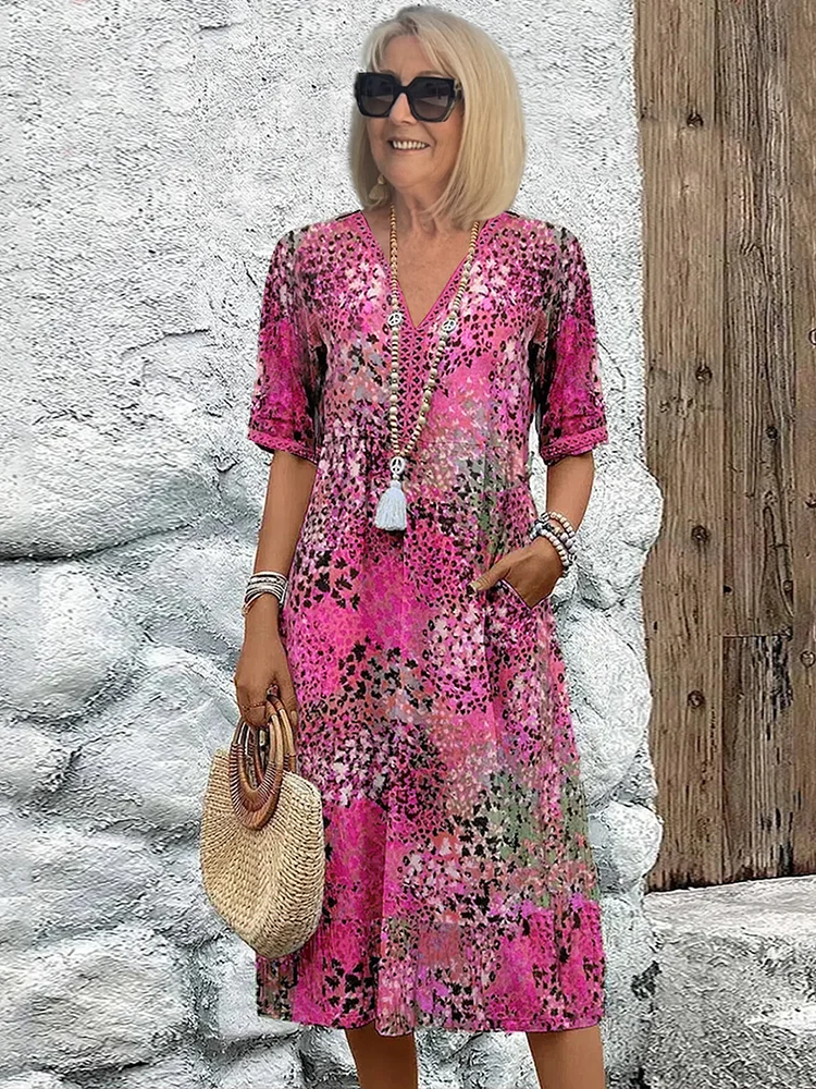 Roxanne | Lebhaftes geblümtes Wickel-Midikleid